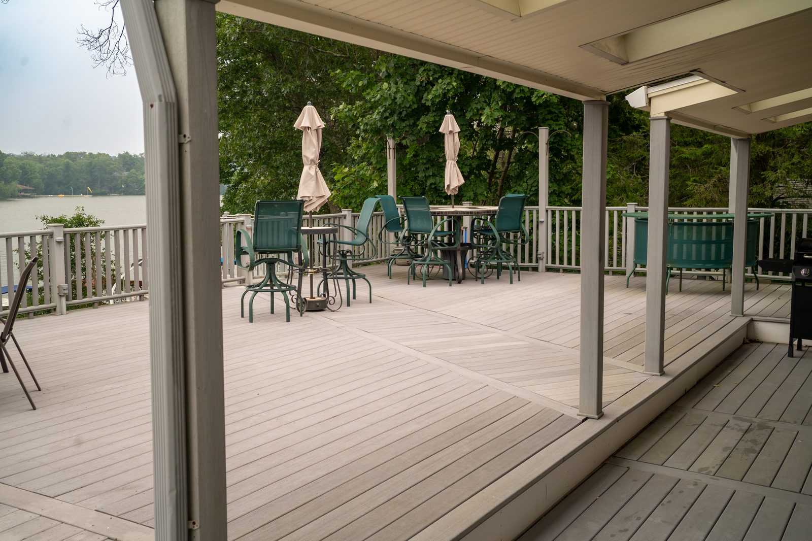 Covered deck looking out over Lake Pocotopaug