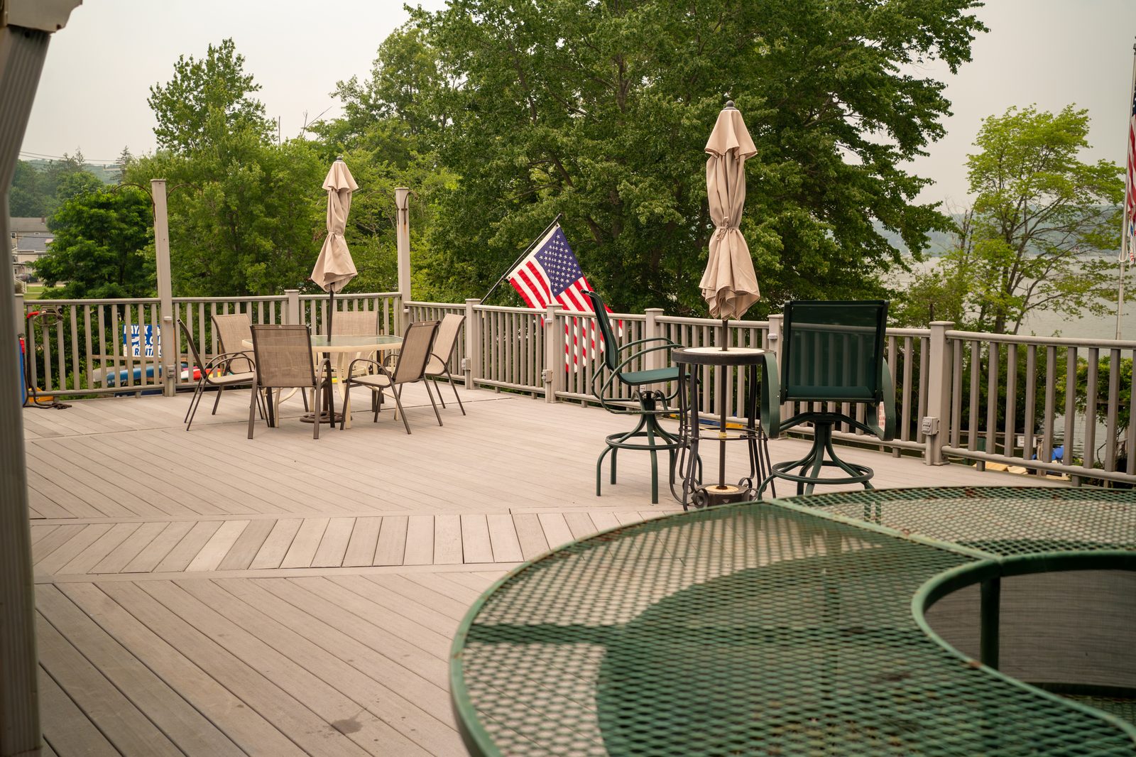 The full deck with seating and umbrellas