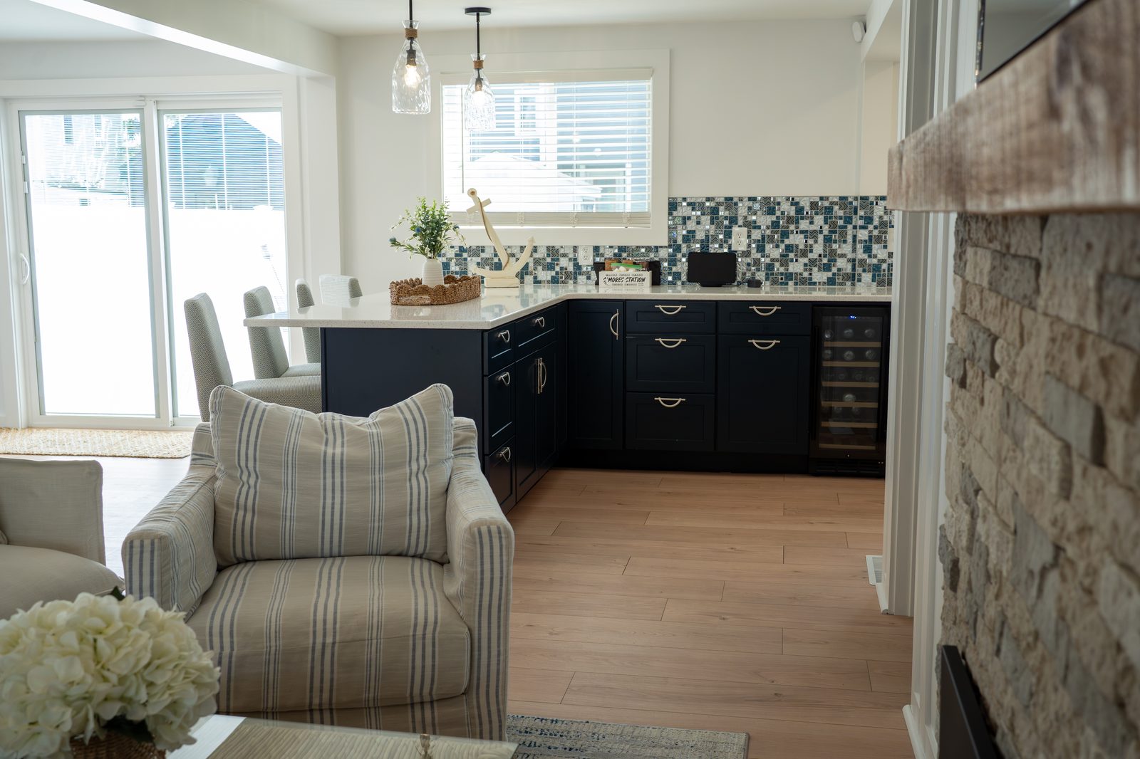 Renovated kitchen with navy cabinets